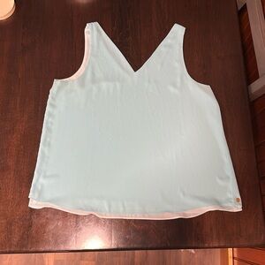 Lily Pulitzer reversible tank. One side is light blue and the other is sky blue.